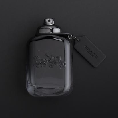هدية عطر كوتش فور مان مع وردة وشمعة