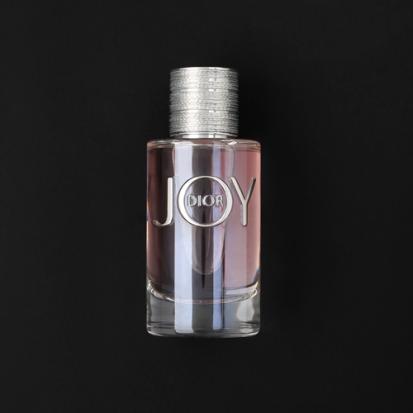 هدية عطر كريستيان ديور جوي مع وردة وشمعة