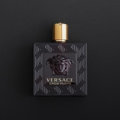 هدية عطر فرزاتشي ايروس فليم مع وردة وشمعة