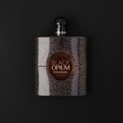 هدية عطر اف سان لوران بلاك أوبيوم مع وردة وشمعة