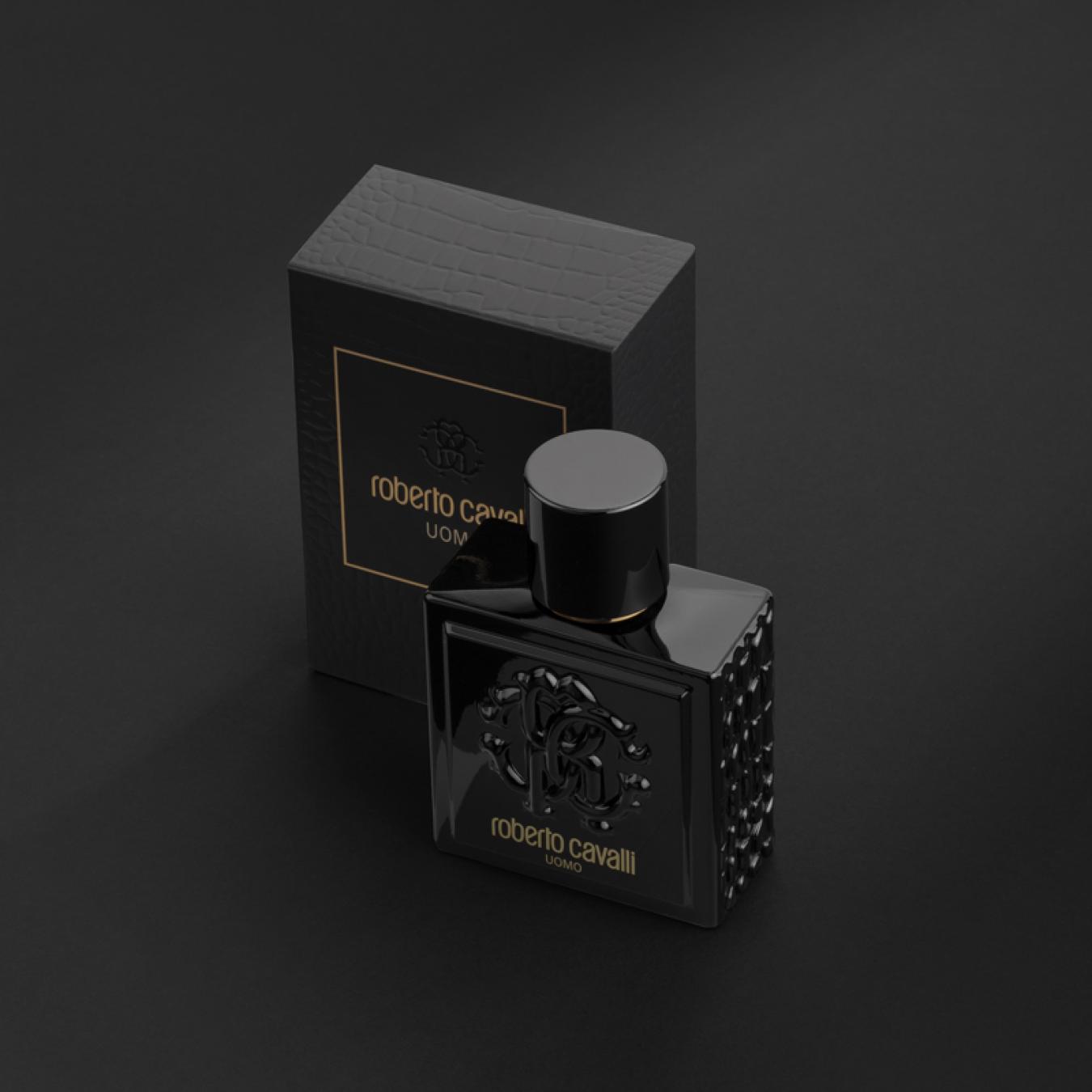 هدية عطر روبرتو كافالي اومو مع وردة وشمعة
