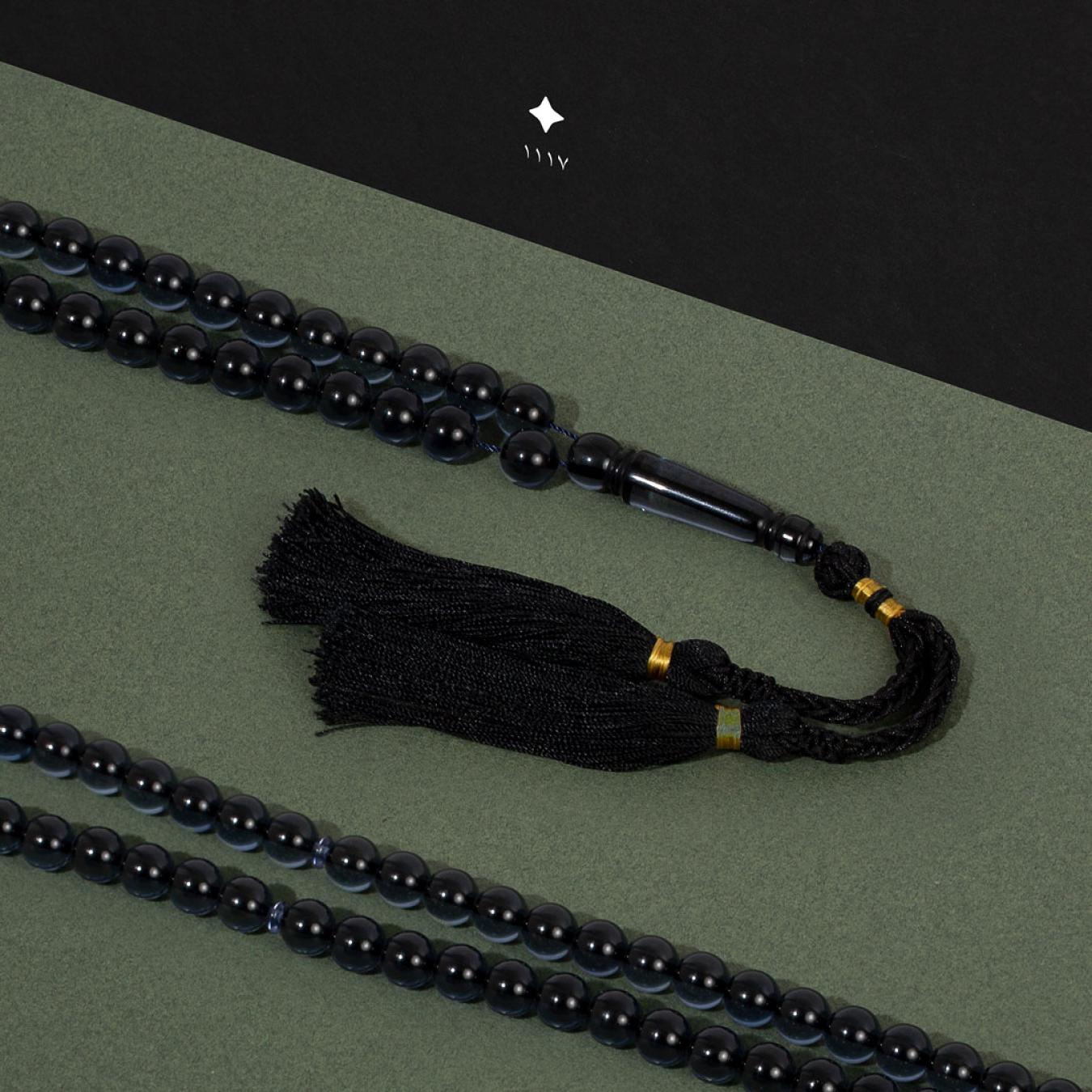 مسباح بكلايت اسود شفاف مع كركوشة TK320